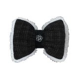 Plush black Chanel-style camellia lumbar support with lace trim