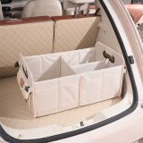 Beige trunk storage bag with bear head sticker