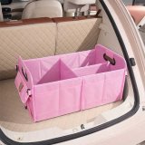Pink bear head sticker on trunk storage bag