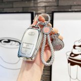 Style C features 2-key quicksand silver accents, gray braided rope, and a lucky bag.