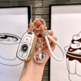 3-button speaker, ivory white color + double-sided diamond logo + diamond-encrusted braided cord
