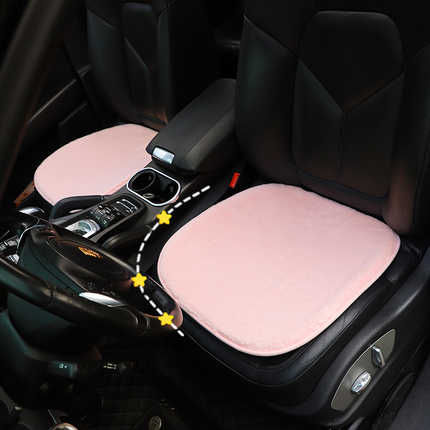 Diy plush frost-proof car seat cushion in soft pink, providing warmth and comfort for winter driving.