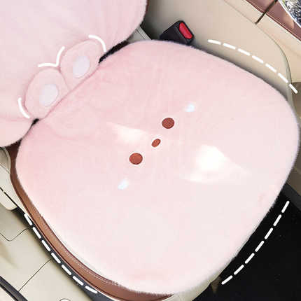 Pink plush bunny winter seat cushion with cute embroidered face, soft and non-slip for cozy car seating.