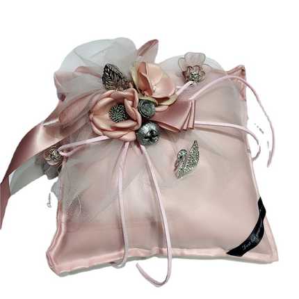 Elegant pink swan bamboo charcoal sachet adorned with floral embellishments, perfect for odor and formaldehyde removal.