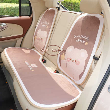 Brown bear plush seat cushion with non-slip design, featuring cute bear pattern and good things happen text for winter warmth...