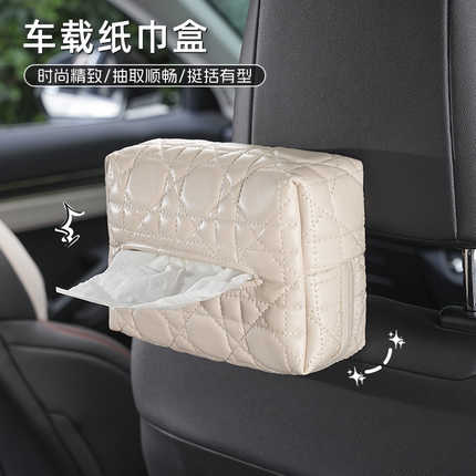 Elegant premium leather car tissue box with quilted design, stylishly attached to armrest for convenient access and refined i...