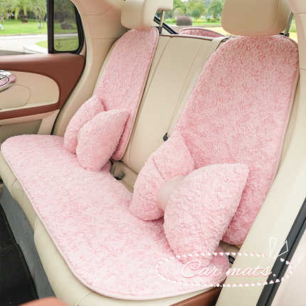 Pink rabbit fur rose car headrest with winter neck pillow, providing cozy comfort for car seats. soft and plush design enhanc...