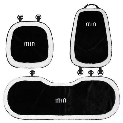 Black goddess winter cushion set with faux fur trim, featuring three pieces labeled min for cozy comfort.