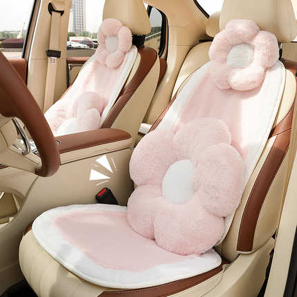 Adorable pink floral plush car headrest and lumbar support set, perfect for all-season comfort in your vehicle.