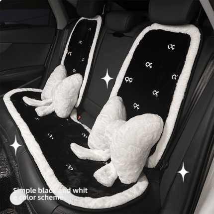 Elevate your cars comfort with the bow plush car seat cushion, featuring a simple black and white design, plush texture, and ...