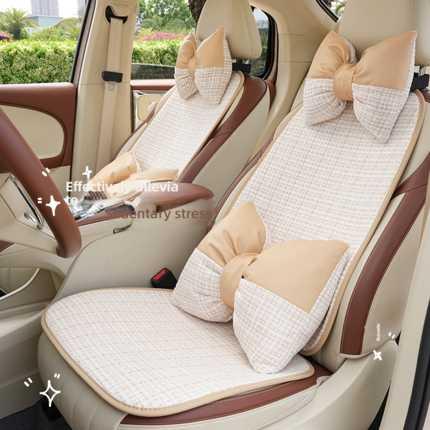 Elegant chanel-inspired car seat cushion with bow accents, offering premium comfort and a non-slip design for enhanced drivin...