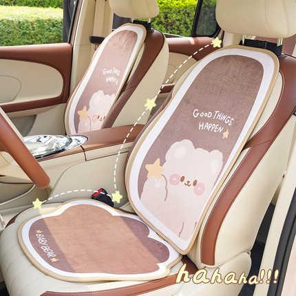 Cute brown bear plush seat cushion with non-slip design, perfect for winter warmth in car interiors.