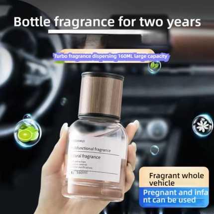 A hand holds a 160ml premium car perfume diffuser, promising two years of fragrance for the whole vehicle; safe for pregnant ...