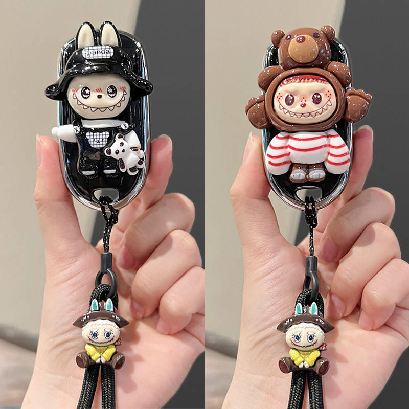 Cute cartoon-themed car key covers for buick regal, enclave, gl8, verano, and velite 6/7, featuring playful designs with atta...
