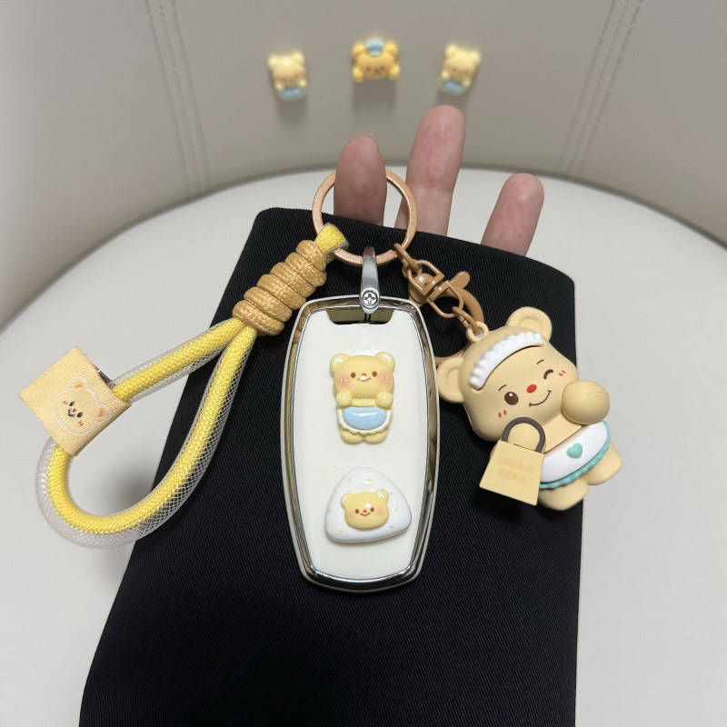 Cute great wall h6 car key cover featuring a full shell design with adorable bear-themed accessories, including a yellow rope...