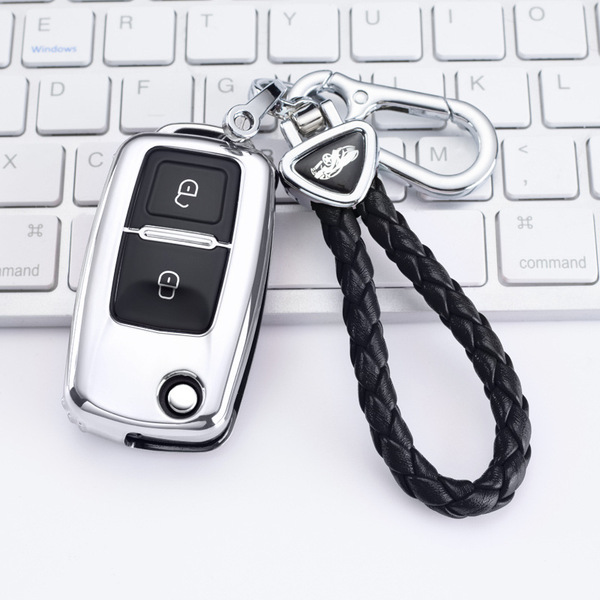 A sleek bideven m6 m7 leiding d70 key cover with a braided leather keychain, displayed on a keyboard for a modern tech vibe.