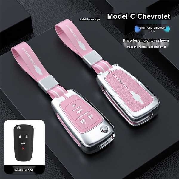 Pink and silver chevrolet key cover for cruze, malibu xl, trax, and equinox, featuring a metal buckle strap and cherry blosso...
