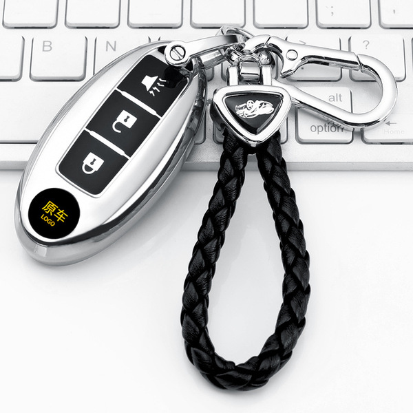Elegant infiniti q50l key cover with braided leather strap, featuring a sleek design and protective casing for your vehicles ...