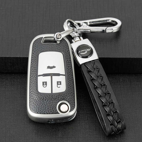 Elegant chevrolet cruze key cover (2020–2022) with leather strap, featuring a sleek black and silver design for enhanced prot...