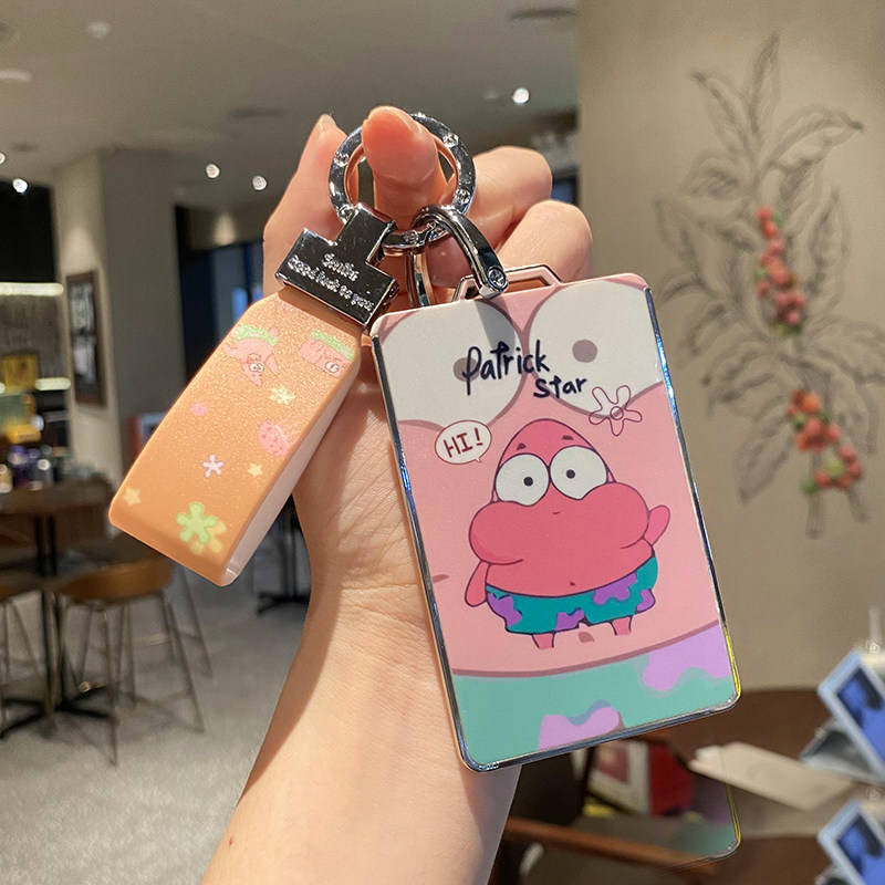 A hand holds a lynk & co 08 car key cover featuring patrick star from spongebob, with a colorful design and nfc card function...