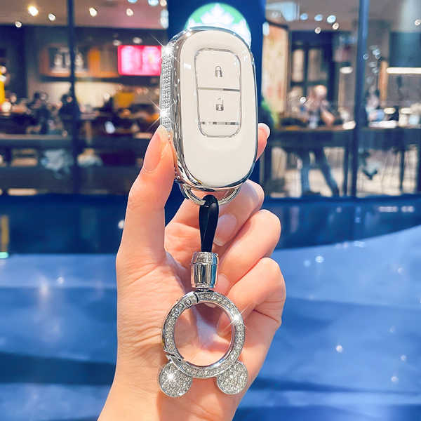 GAC Honda皓影 Key Cover - Luxury & Stylish | Wholesale & Custom - Style O features a two-button diamond-encrusted milky white finish with silver trim and a rhinestone Mickey Mouse clasp.