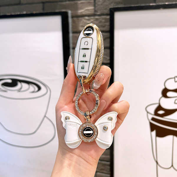 Nissan Qashqai Key Cover - Durable & Stylish | Wholesale & Custom Logo - Style E, ivory white with diamond-studded bow.