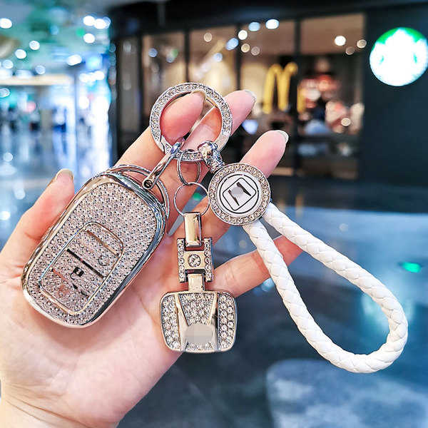 Elegant 2023 honda cr-v key cover with sparkling rhinestones, featuring a sleek design and matching keychain, perfect for civ...