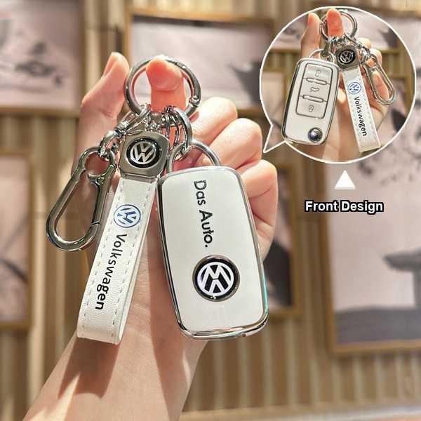 Premium leather vw key cover for jetta, polo, and tiguan, featuring das auto design and volkswagen logo, showcased with a mat...