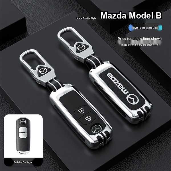 Silver and deep space black mazda key cover for cx-3/cx-5/cx-9, mx-5, mazda3/6/7, featuring a sleek metal buckle design and p...
