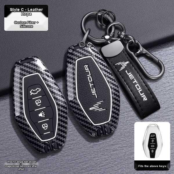 Chery jetour x70 plus key cover 2024 featuring a sleek carbon fiber and silicone design with a leather rope keychain, shown b...