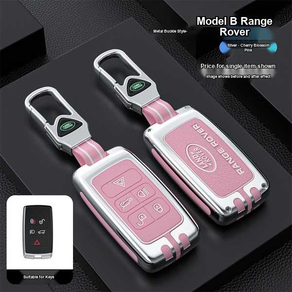 Pink and silver land rover key cover for range rover, defender 110 & discovery models, featuring a metal buckle design and pr...