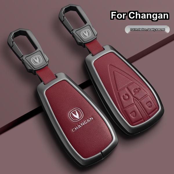 Elegant red leather key cover for changan cs75 plus, featuring a sleek design with embossed buttons and a secure carabiner cl...
