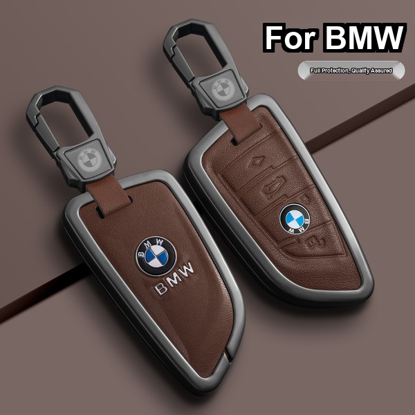 Elegant leather bmw key cover for 5 series and 325li, featuring a sleek design with the iconic bmw logo and secure clip for f...