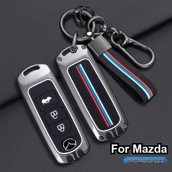 Protect your mazda key with a sleek, full-protection cover featuring iconic red, blue, and white stripes, designed for cx-3, ...
