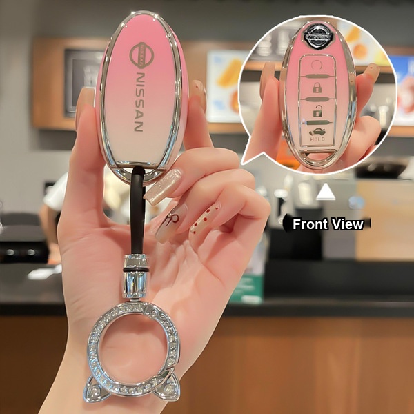 Elegant nissan alloy key cover for altima, sentra, rogue & more, featuring a gradient pink design and cat-shaped keychain, sh...