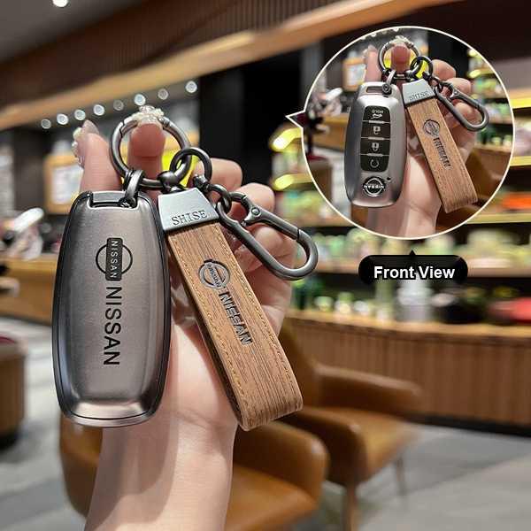 Elegant nissan altima key cover featuring a sleek leather strap and premium metal finish, designed for womens 2023 luxury veh...
