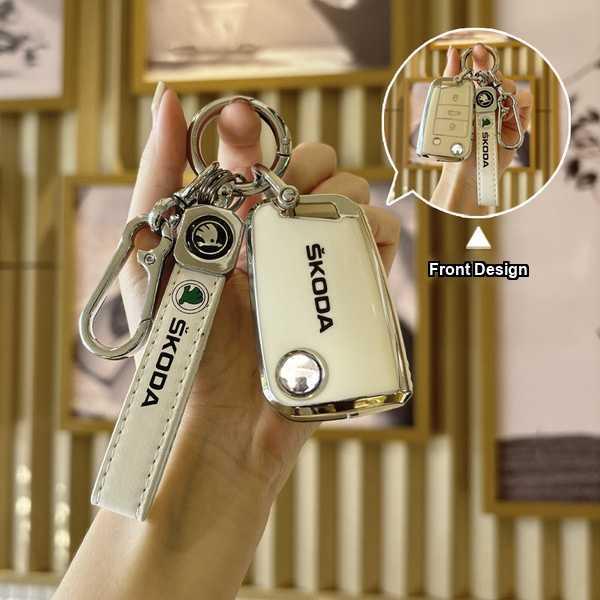 Elegant skoda key cover for octavia, superb, and yeti, featuring premium leather with a sleek front design and secure keychai...