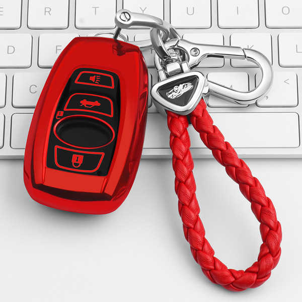 Red subaru forester 2021 key cover with braided red leather keychain, featuring a sleek design and functional buttons, displa...