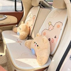 Cute bear-themed ice silk car seat cushion with plush accents, offering all-season comfort and non-slip grip for a cozy ride.