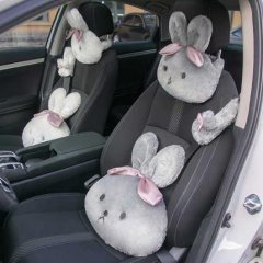 Long-haired rabbit car headrest pillows: adorable plush designs with pink bows, enhancing comfort and style in your vehicle.