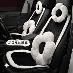 Floral plush car headrest & lumbar pillow set, featuring white and black plush designs for added comfort in your vehicle.