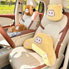 Adorable cartoon monkey car headrest pillows: plush, all-season comfort for your vehicles interior.