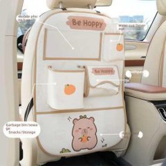 Kapibala car storage bag: a cute, leather-like organizer with a cartoon bear design, featuring pockets for snacks, water cups...