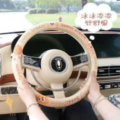 Cheese biscuit steering wheel cover with sweet dream design, offering a non-slip and sweat-absorbing grip for comfortable dri...