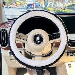 Rabbit fur steering wheel cover: soft, plush winter accessory for cozy driving, shown on a car dashboard with a luxurious int...