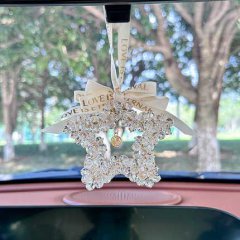 Elegant crystal five-pointed star car pendant with love is eternal bow, perfect for rearview mirror decoration.