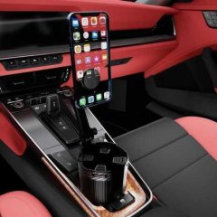 A sleek 2-in-1 car cup and phone holder with an adjustable mount, securely holding a smartphone and a beverage cup in a moder...
