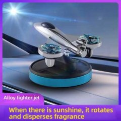 Solar-powered alloy fighter jet car fragrance diffuser rotates to disperse scent, perfect for dashboard decoration.