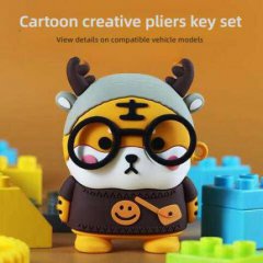 Cute antler tiger car key cover featuring a cartoon tiger with glasses, antlers, and a smiley design, perfect for adding char...