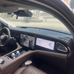 Exeed txl 2023-2025 sun shade dash cover protecting the dashboard, enhancing interior aesthetics with a sleek design.